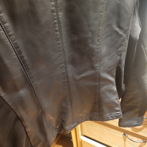 Faux leather jacket.  With material on arms. Very cute - Picture 10 of 12